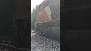 CN U70261 crawling by at Slippery Rock PA with a wave from the engineer [upl. by Flemings502]