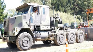 ExUS Military Oshkosh M1070 Truck Pulling a DeutzFahr 8280 TTV Tractor in Waimumu [upl. by Lombard]