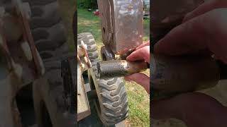 How to remove the pins from a Bobcat Bobtatch Bottom tapered pins [upl. by Tench3]