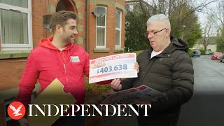 Biggest Postcode Lottery winner still in shock as hes presented cheque [upl. by Calesta232]