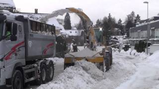 Volvo L70E with snowblower loading truck  Oslo Norway [upl. by Ahsitan]