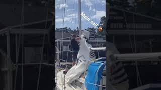 Installing the main sail sailing boatlife boating [upl. by Cohligan]