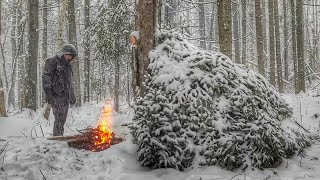 Caught in a SNOWSTORM  WINTER SURVIVAL BUSHCRAFT SHELTER in Heavy Snow Bushcraft Trip [upl. by Fernald]