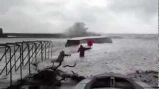 People swept off their feet by waves on Monmouth Beach in Lyme Regis [upl. by Norry485]