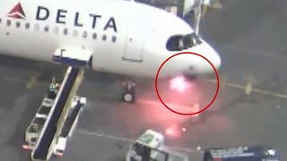 WATCH  Passengers deplane after fire under cockpit of Delta Airlines aircraft [upl. by Magnuson521]