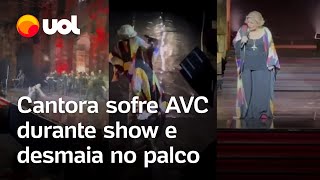 Cantora grega sofre AVC durante show cai no palco e é socorrida às pressas vídeo mostra momento [upl. by Peace322]