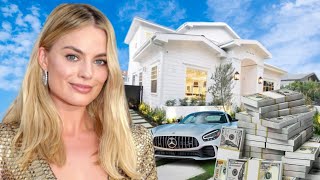 How Much Margot Robbies Net Worth🤑 [upl. by Ahsilahk]