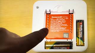 Change Batteries Honeywell Home Thermostat [upl. by Marijn949]