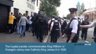 Orangemen parade through Belfasts Ardoyne district [upl. by Eisoj]