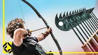 Can You Fire an Arrow through 12 Axes Odysseus Archery Challenge [upl. by Acinorahs]