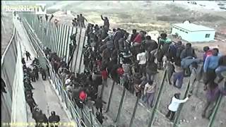 Refugee invasion in Melilla Spain [upl. by Doralia749]