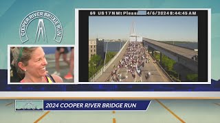 Thousands of runners and walkers cross the Ravenel Bridge during the Cooper River Bridge Run [upl. by Wernda115]