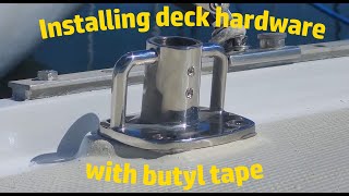 Installing deck hardware stanchion base with butyl tape [upl. by Arikaahs]