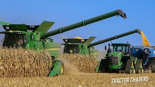 Two John Deere S780 Combines Harvesting Corn with John Deere Tractors [upl. by Denton]