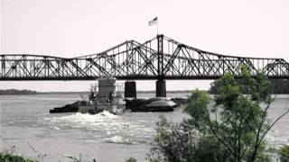 THE GREAT FLOOD 2011 Vicksburg  BargeCargo traveling under the MSLA Bridge [upl. by Anitnoc]