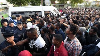 France Police evict thousands of migrants camped in northern Paris [upl. by Nosinned929]