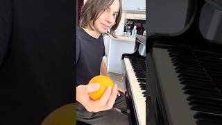 Stelios playing the piano with an orange ❤️🤯🍊🎹stelioskerasidis piano chopin blackkeys [upl. by Iaverne]