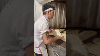 The art of baking barbari bread in Iran by a young man with a beautiful tattooshortsvideo bread [upl. by Isaac]