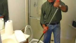 How to Clear a Toilet Clog using a Closet Auger [upl. by Petronia]