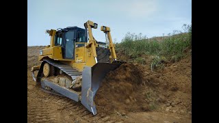 CAT D6T Pushing topsoil [upl. by Nnylkcaj918]