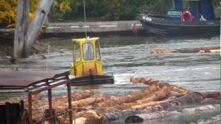 Boomboat assembling a lograft at Jordan River on Vancouver Island [upl. by Idnahr]