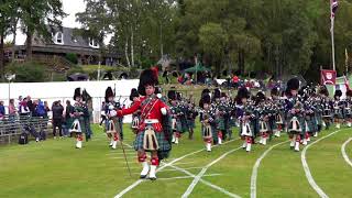 Braemar Gathering 2018 opening Parade by Ballater Pipe Band before Royal Highland Games committee [upl. by Aerdnas]