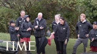 Whats Welly Wanging Meghan Markle Beat Prince Harry At This Cool Boot Throwing Game  TIME [upl. by Hike]