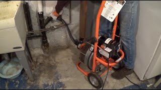 How to Unclog a Sewer Line with a Rented Drain Cleaner [upl. by Bouzoun45]