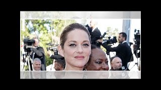 PHOTOS – À Cannes la robe trans­pa­rente osée de Marion Cotillard [upl. by Lihcox]