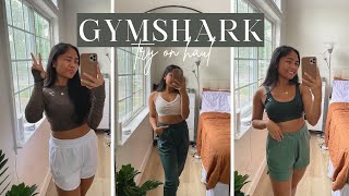 gymshark sale try on haul 2022  lookbook  must haves  up to 60  styling 9 pieces [upl. by Grunenwald853]