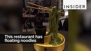 This restaurant defies gravity with its flying noodles [upl. by Llemej]