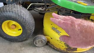 How to Change Mower Blades on your John Deere S100 Lawn Tractor 42quot Deck [upl. by Jolee795]