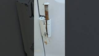 Remove side door amp pins from 2000 chevy express van Grind rust off pins amp grease drop in from top [upl. by Genaro]