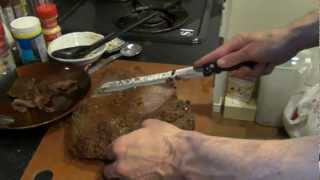 How to cook smoked brisket on a gass grill Cooking and carving a smoked brisket on a gass grill [upl. by Gualtiero]