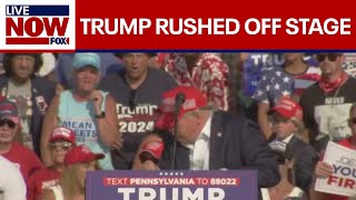 WATCH Trump takes cover at rally rushed off stage  LiveNOW from FOX [upl. by Ardin]