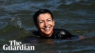 Paris mayor swims in the Seine to show its clean enough for Olympic swimming events [upl. by Yruj]