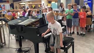 Amazing airport pianist Harrison aged 11 plays Ludovico Einaudi cover Nuvole Bianche [upl. by Clotilda770]