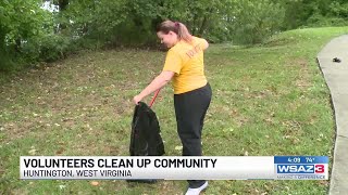 Volunteers clean up community in Huntington [upl. by Nosrak]