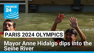 Paris Mayor Anne Hidalgo swims in the Seine nine days before Olympic Games kickoff • FRANCE 24 [upl. by Enelyaj]