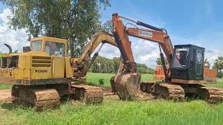 หาชมยากรถขุดแพคคู่ร้อยปีในตำนาน komatsu pc60u2 กับ hitachi uh04 จอดรอฝนหยุด excavator [upl. by Jecoa]