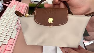 UNBOXING  Longchamp Le Pliage Pouch with Handle in Paper [upl. by Yetnom]