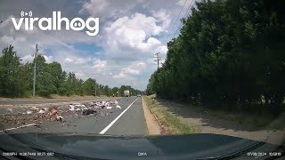 Garbage Truck Leaves Trash Strewn All Over Road  ViralHog [upl. by Alejna]