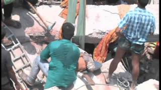 Building collapse victims use cloth slides to escape [upl. by Ennaihs]