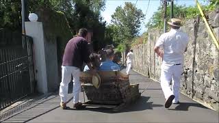 Madeira toboggan ride  Funchal  Monte  Downhill basket ride  Madeira Island  Tobogan [upl. by Ayiram]