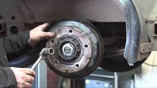 Inspecting and adjusting a Knott trailer brake [upl. by Ecinnaj]