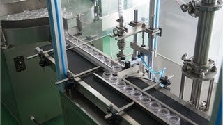 6 filling nozzels liquid filling machine with round buffer tableliquid filler machine [upl. by Arahd9]