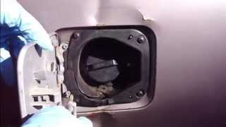 How to replace fuel tank cover plate Toyota Camry [upl. by Eninnej]