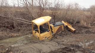 Dozer Recovery CAT Excavator pulls Deere Dozer Out [upl. by Vaientina]