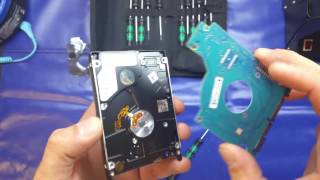 Teardown of a Seagate 25quot SATA hard drive [upl. by Illek690]