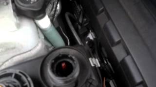 BMW Low Coolant Adding coolant Low Coolant Warning How to add coolant to your BMW [upl. by Ahseinek]